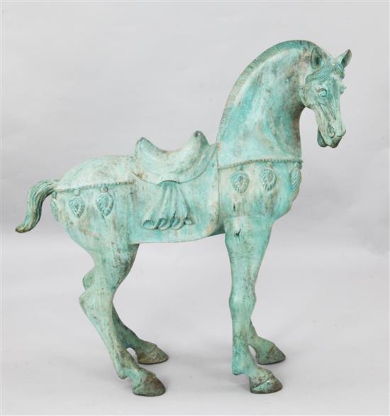 A Tang style bronze horse garden statue, H.3ft 2in.